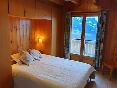 Ein Bett oder Betten in einem Zimmer der Unterkunft Chalet in Veysonnaz with valley view