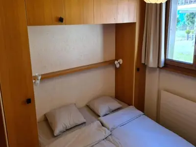 Ein Bett oder Betten in einem Zimmer der Unterkunft Apartment Veysonnaz near Ski Lift & Shuttle