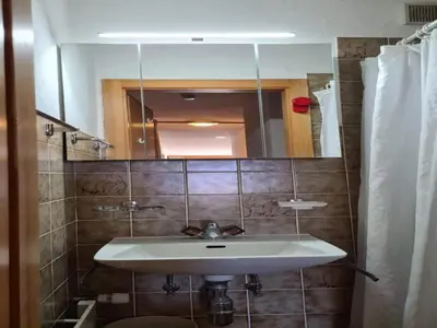 Ein Badezimmer in der Unterkunft Apartment Veysonnaz near Ski Lift & Shuttle