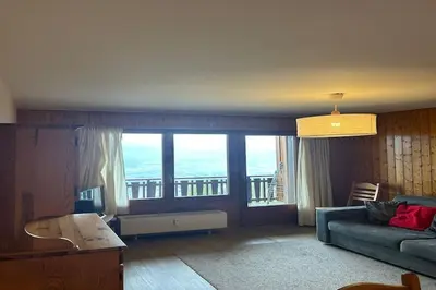 Ein Sitzbereich in der Unterkunft Apartment near Piste des Mayens ski-slope