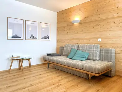 Ein Sitzbereich in der Unterkunft Adler Residenz 14
