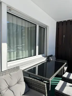 Ein Sitzbereich in der Unterkunft Gemütliche Wohnung im Haus Pfeiren