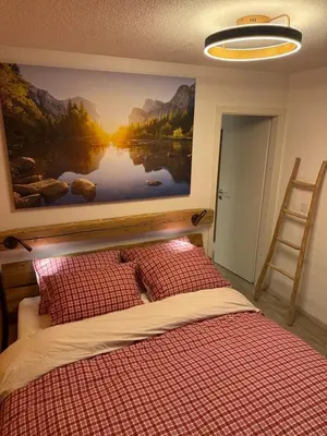 Ein Bett oder Betten in einem Zimmer der Unterkunft Appartement cosy - accès direct piscine et SPA