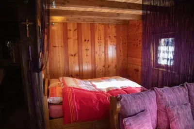 Ein Bett oder Betten in einem Zimmer der Unterkunft Chalet 