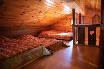 Ein Bett oder Betten in einem Zimmer der Unterkunft Chalet 