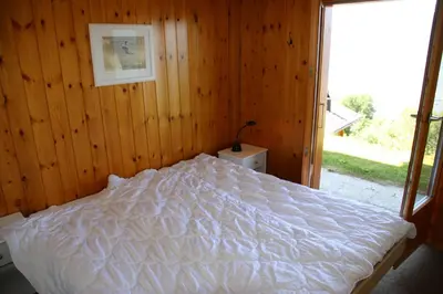 Ein Bett oder Betten in einem Zimmer der Unterkunft Fontannets 009 MOUNTAIN & QUIET chalet 8 pers