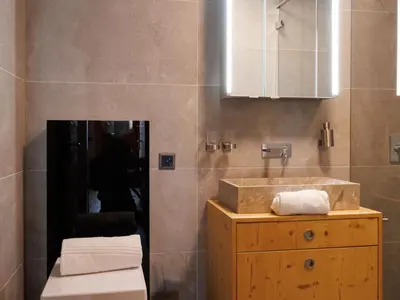 Ein Badezimmer in der Unterkunft Chalet Nous Deux by Interhome
