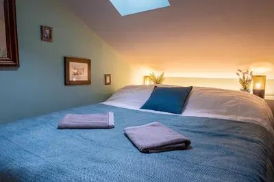 Ein Bett oder Betten in einem Zimmer der Unterkunft Tiny house Les Nomades