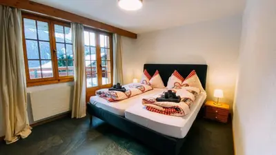 Ein Bett oder Betten in einem Zimmer der Unterkunft Chalet Panorama - Stunning View