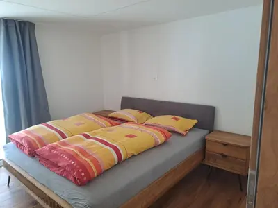 Ein Bett oder Betten in einem Zimmer der Unterkunft Adventura