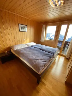 Ein Bett oder Betten in einem Zimmer der Unterkunft Panoramalodge Aatos