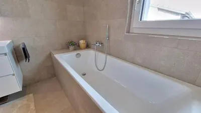Ein Badezimmer in der Unterkunft Mountainside Homestay in Spiez by Menbergs Harmony Homestay