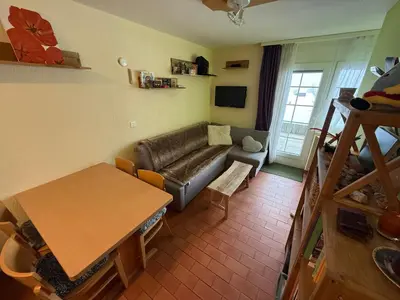 Ein Sitzbereich in der Unterkunft Studio accessible en ski et en voiture