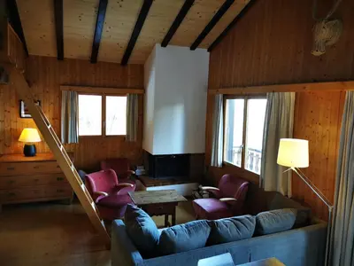 Ein Sitzbereich in der Unterkunft Chalet St-Hubert