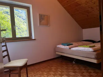 Ein Bett oder Betten in einem Zimmer der Unterkunft Wild Valley Serenity in Valle Onsernone