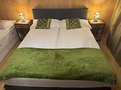 Ein Bett oder Betten in einem Zimmer der Unterkunft Bellevue Apartment