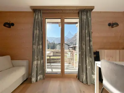 Ein Sitzbereich in der Unterkunft Flat with magnificent views of the Matterhorn