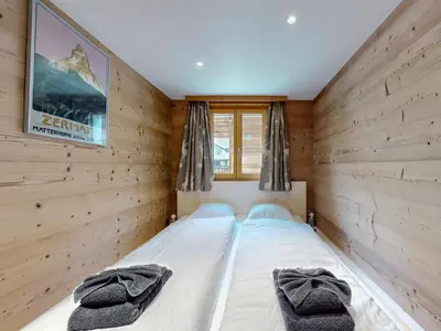 Ein Bett oder Betten in einem Zimmer der Unterkunft Flat with magnificent views of the Matterhorn