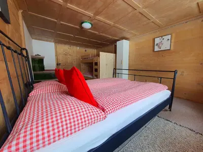 Ein Bett oder Betten in einem Zimmer der Unterkunft Burgbühler Guesthouse