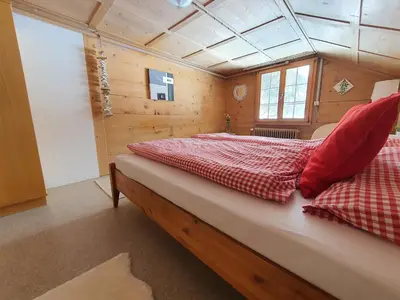 Ein Bett oder Betten in einem Zimmer der Unterkunft Burgbühler Guesthouse