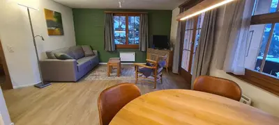 Ein Sitzbereich in der Unterkunft Chalet am Bluemewäg 7