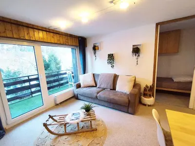 Ein Sitzbereich in der Unterkunft Chalet Alpin, central et parking