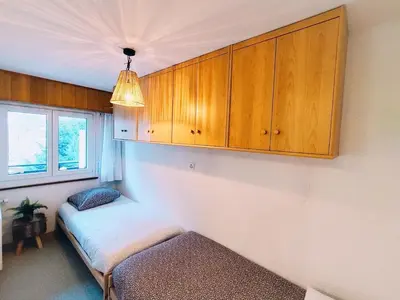 Ein Bett oder Betten in einem Zimmer der Unterkunft Chalet Alpin, central et parking