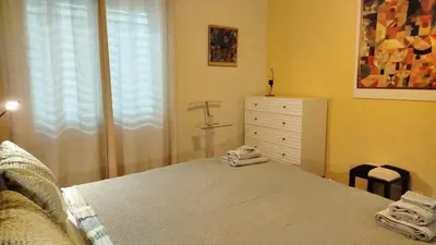 Ein Bett oder Betten in einem Zimmer der Unterkunft Merligen 15 min to Interlaken Seeblick