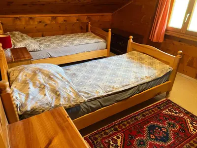 Ein Bett oder Betten in einem Zimmer der Unterkunft Alpen Rose 3 Wohnungen