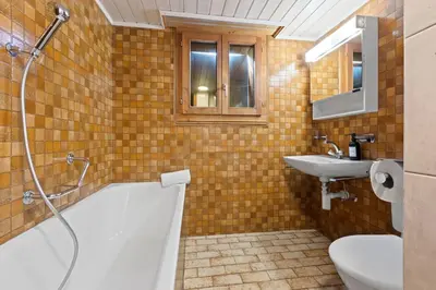 Ein Badezimmer in der Unterkunft Charmant appartement familiale proche de Saas-Fee