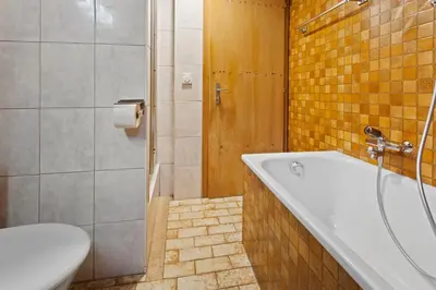 Ein Badezimmer in der Unterkunft Charmant appartement familiale proche de Saas-Fee
