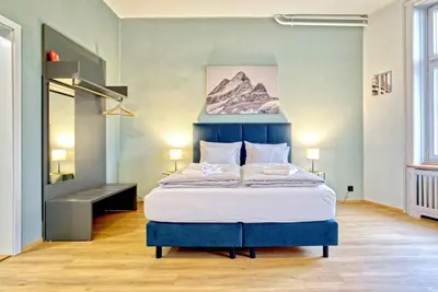 Ein Bett oder Betten in einem Zimmer der Unterkunft BANK House Studio L 104 - GRIWA RENT