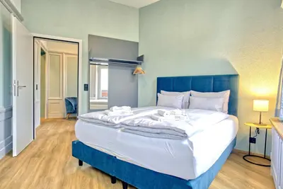 Ein Bett oder Betten in einem Zimmer der Unterkunft BANK House Apartment XL 105 - GRIWA RENT
