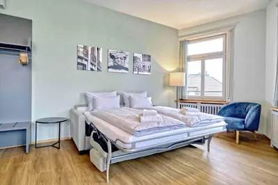 Ein Bett oder Betten in einem Zimmer der Unterkunft BANK House Apartment XL 304 - GRIWA RENT