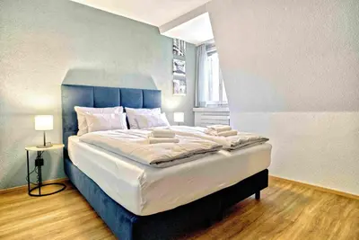 Ein Bett oder Betten in einem Zimmer der Unterkunft BANK House Apartment XL 403 - GRIWA RENT
