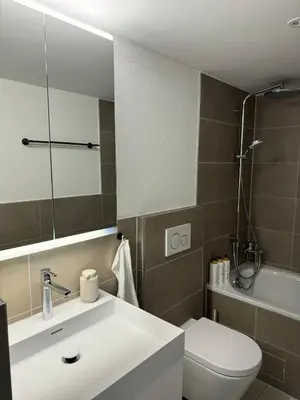 Ein Badezimmer in der Unterkunft Appartement Niesenblick 1