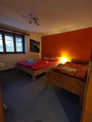 Ein Bett oder Betten in einem Zimmer der Unterkunft Chalet Sandgrube
