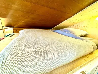 Ein Bett oder Betten in einem Zimmer der Unterkunft Amazing River and Mountain View Apartment