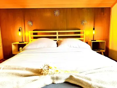 Ein Bett oder Betten in einem Zimmer der Unterkunft Amazing River and Mountain View Apartment