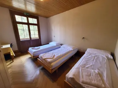Ein Bett oder Betten in einem Zimmer der Unterkunft Nordic Arena House