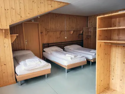 Ein Bett oder Betten in einem Zimmer der Unterkunft Nordic Arena House