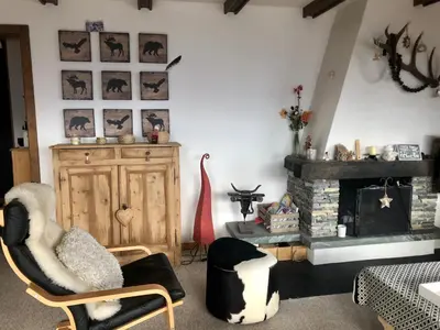 Ein Sitzbereich in der Unterkunft Immeuble Les Aiglons