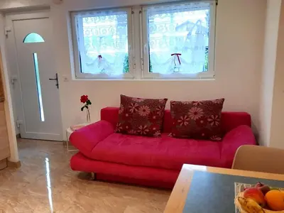 Ein Sitzbereich in der Unterkunft Appartement au bord de l'eau 33m2 Le Cerisier