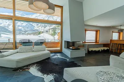 Ein Sitzbereich in der Unterkunft Luxury Panorama Apartment Tola