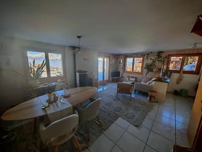 Ein Sitzbereich in der Unterkunft Chalet cosy avec vue incroyable