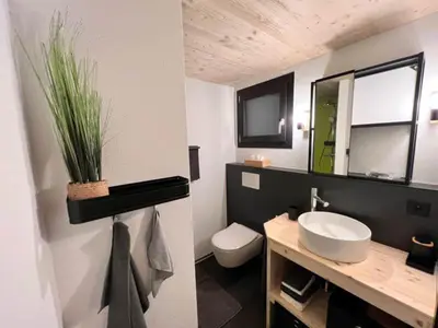 Ein Badezimmer in der Unterkunft studio suite im Fresh Cube