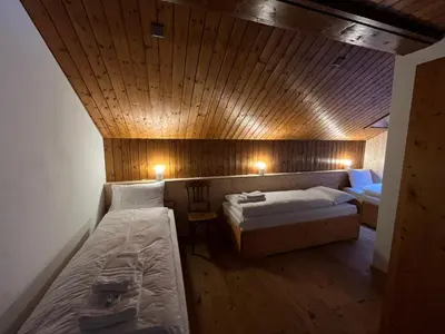 Ein Bett oder Betten in einem Zimmer der Unterkunft Sust Lodge