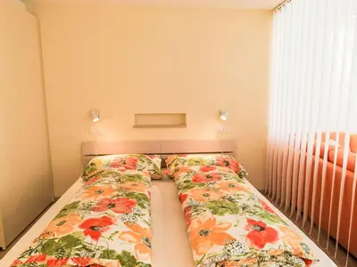 Ein Bett oder Betten in einem Zimmer der Unterkunft Apartment Cristal-5 by Interhome