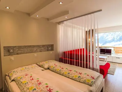 Ein Bett oder Betten in einem Zimmer der Unterkunft Apartment Cristal-6 by Interhome