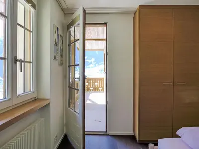 Ein Bett oder Betten in einem Zimmer der Unterkunft Apartment Chalet Adlerhorst OG by Interhome